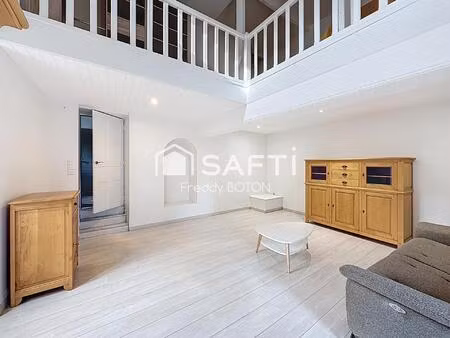 maison de caractère en cœur de ville avec jardin intimiste et fort potentiel.