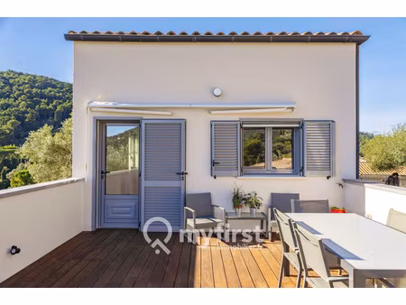 un appartement entre jardin secret et rooftop suspendu