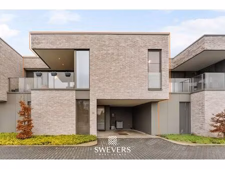 trendy woning met 2 slpk  2 bergingen en leuk terras (o) vlakbij centrum zonhoven
