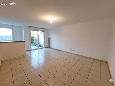 appartement 2 pièces 42 m² en rez-de-jardin + 2 parkings