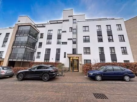 rez-de-chaussée neuf de 124m² avec jardin d'hiver