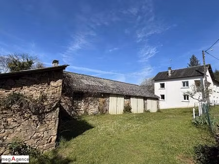 entre brive et tule - maison avec dépendances en pierre  mare et puits