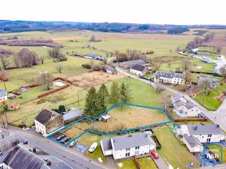 à 5 minutes de l’e411 – parcelle à bâtir de 15 ares 02ca.