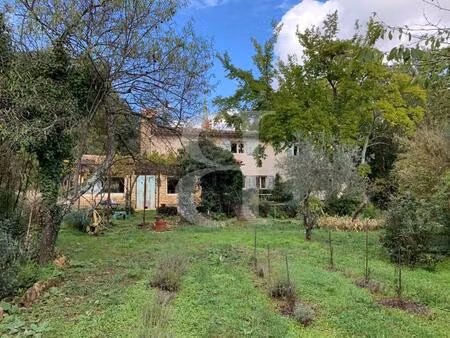 maison en pierres avec terrain en partie constructible à grigna