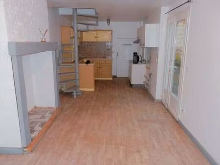 maison de ville avec jardin et parking intérieur