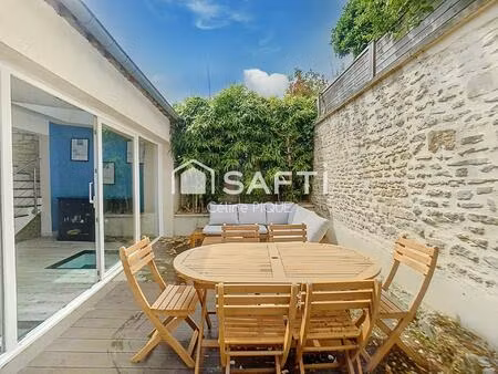 maison de ville rénovée avec terrasse et balcon