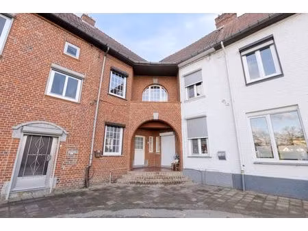 te renoveren rijwoning met veel potentieel in hartje genk