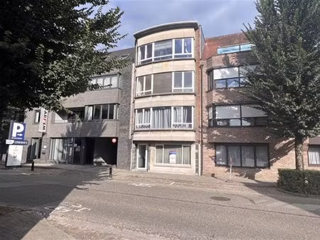 opbrengsteigendom met 4 appartementen en tuin