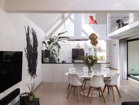 bijzondere eigendom gelegen in een voormalige industriële katoenspinnerij.