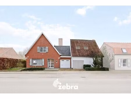 ruime woning met grote tuin  zwemvijver en schuur in beveren aan de ijzer!