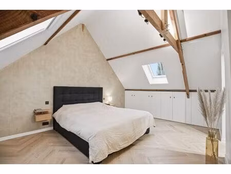 halfopen bebouwing met uitweg en carport in het hartje van zwevezele