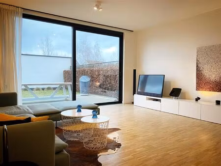 aangenaam kwalitatief appartement (gelijkvloers) met 2 slpks  tuintje/terras  ruime garage