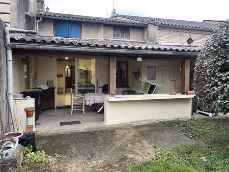 maison de ville avec jardin.