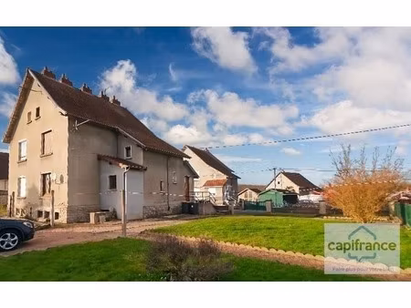 maison mitoyenne de 100 m²  combles aménageables  jardin et garage : une opportunité à cir