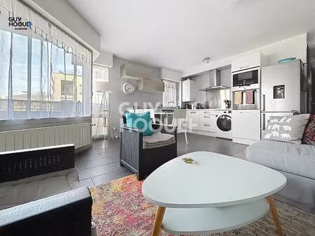 appartement 2 pièces 48.3m² ( dpe en c ) avec balcon 4m² + cave et parking en parfait état