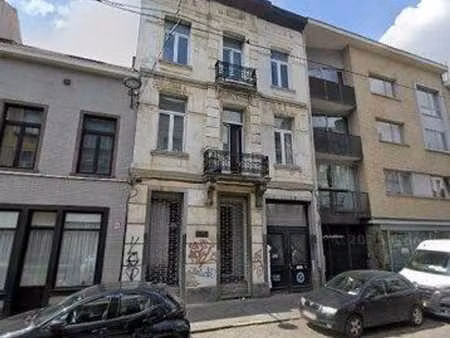 une maison de commerce et de rapport
