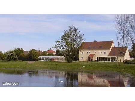 ranville  propriété de 533 m² avec piscine couverte