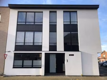 5 appartements et 7 places de stationnement