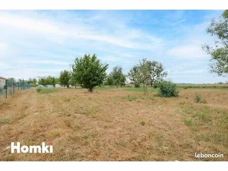 terrain 1 000 m² longages