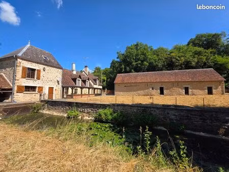 ancien moulin de 253m2 avec son brief en eau et 2ha49a79ca de terrain