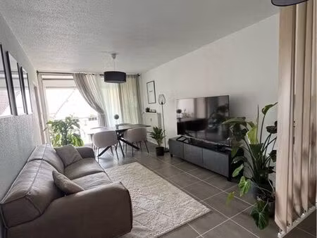 appartement f3 de 64 m² avec balcon  cave et garage