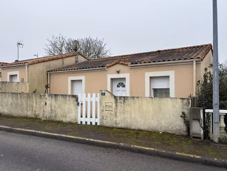 'maison de plain-pied avec jardin au coeur du bourg'