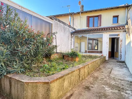 charmante maison de ville avec jardin et garage - saint-sulpice-la-pointe - 74m²