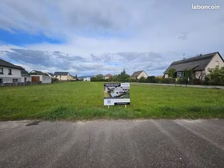 terrain 608 m² houssen