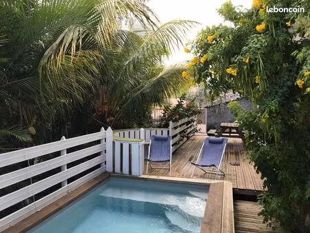 t4 dans un écrin de verdure avec bac à punch