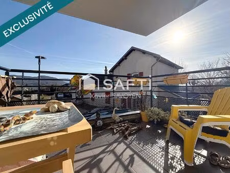 centre village – t4 avec balcon et garage