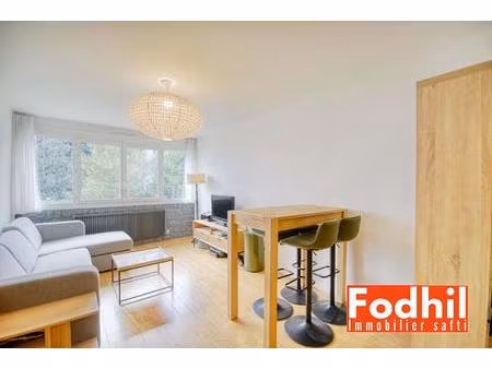 appartement 3 pièces de 65m² avec cave et parking.