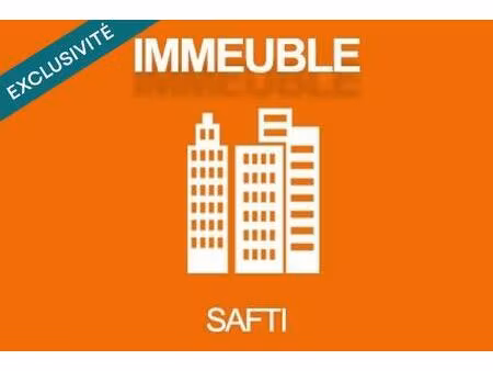 immeuble libre à fort potentiel au coeur d'un village prisé