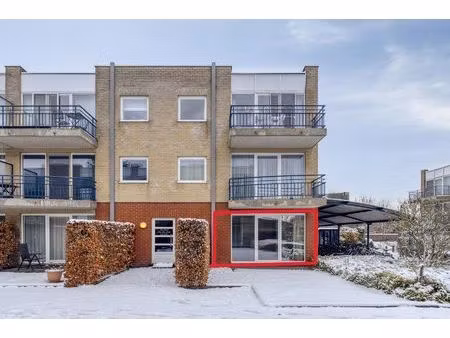 gelijkvloersappartement met 2 slaapkamers en tuintje