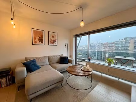 trendy gemeubeld appartement met ondergrondse autostaanplaats