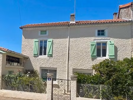 maison de village avec garage et dépendance