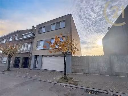 immeuble de rapport 2 unités+garage+jardin