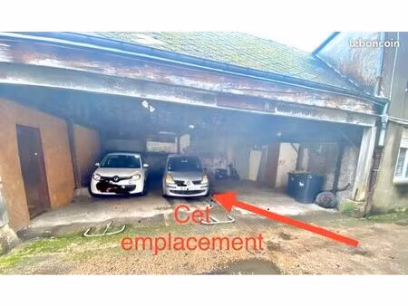 place de parking sous abri.plein centre st romain