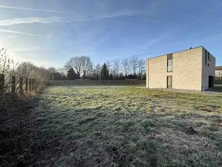 ruim perceel voor open bebouwing in nieuwe wijk in wespelaar