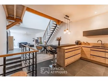 maison familiale rénovée : volumes cathédrale et esprit contemporain