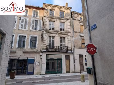 investissement locatif  immeuble avec patio et 2 appartements