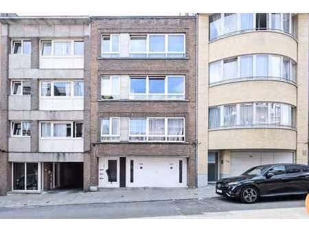 immeuble 3 appt. double garage jardin