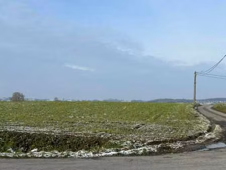 terrain de 12 ares et 59 centiares