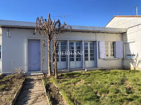 maison de plain-pied avec garage et jardin