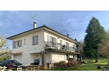 maison avec garage et terrain