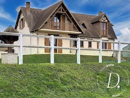 belle maison de style normand sur un sous-sol total environn