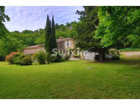 a 5 mn de saou superbe propriété en pierres avec parc arboré bordé par le roubion