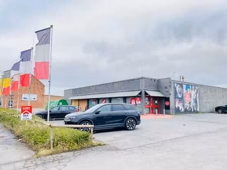 comines- local commercial de 520 m² + parking