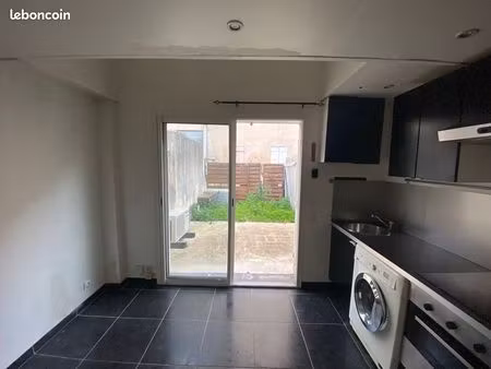 t2 avec jardinet rare – cœur du 5ième  calme et ensoleillé