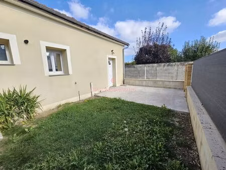 loft de 60 m² habitables avec cour de 38 m²