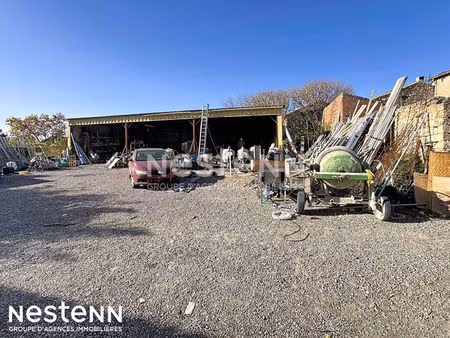terrain à bâtir de plus de 800 m² avec hangar métallique démontable